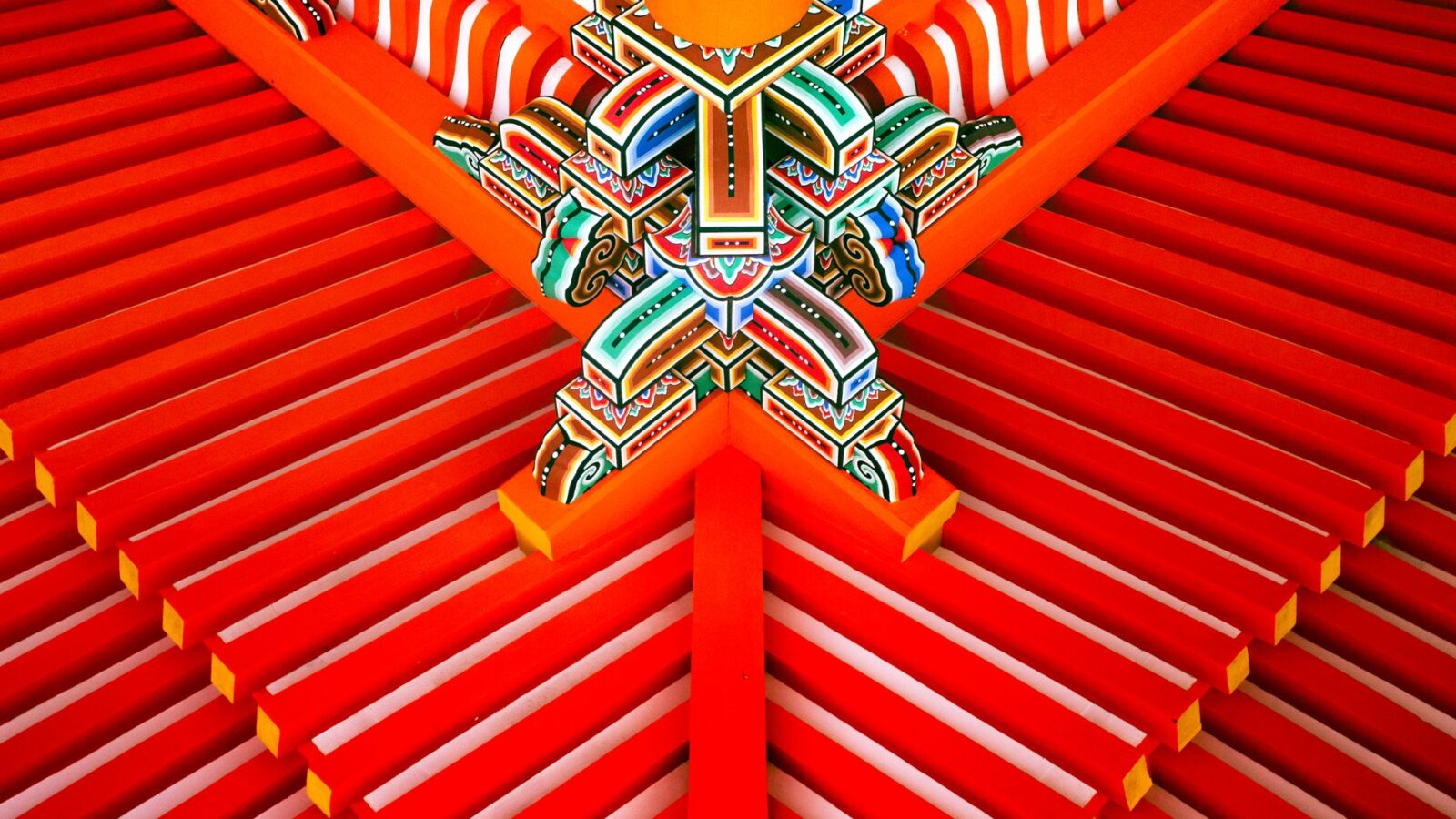 Vivid geometric roof detail showcasing traditional Japanese temple architecture.